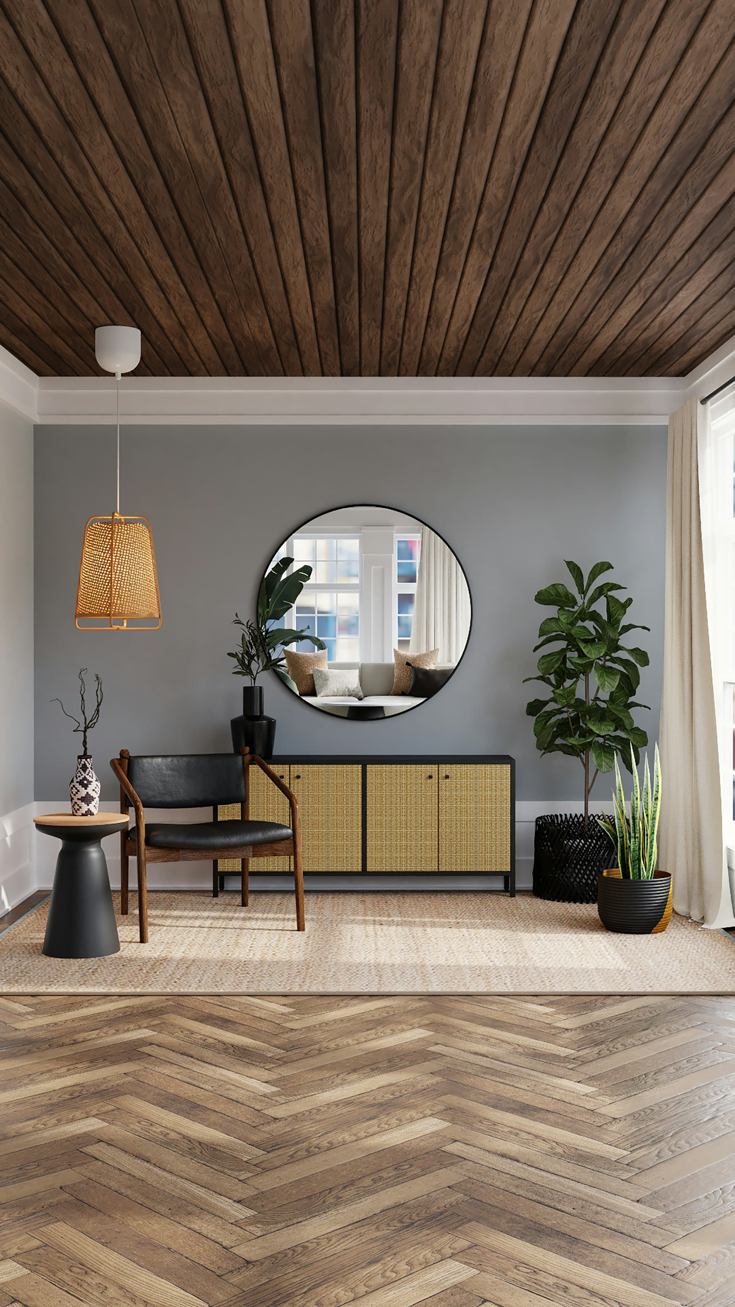 Quiet niche with a console, round mirror and warm pendant light